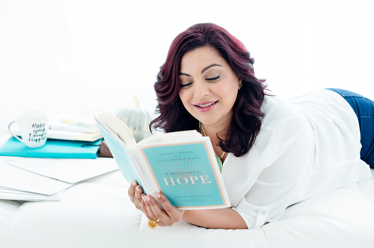 Personal branding photo of woman reading book . it is your opportunity to shape how the world perceives you, making a lasting impression that truly sets you apart. It acts as your professional fingerprint, highlighting your unique values, skills, and personality in a way that feels authentic and impactful. The exciting part is that building your personal brand also strengthens your business. By aligning personal and business branding with cohesive elements like color schemes and fonts, you create a unified identity that stands out across all platforms. Are you ready to unlock the full potential of your brand?